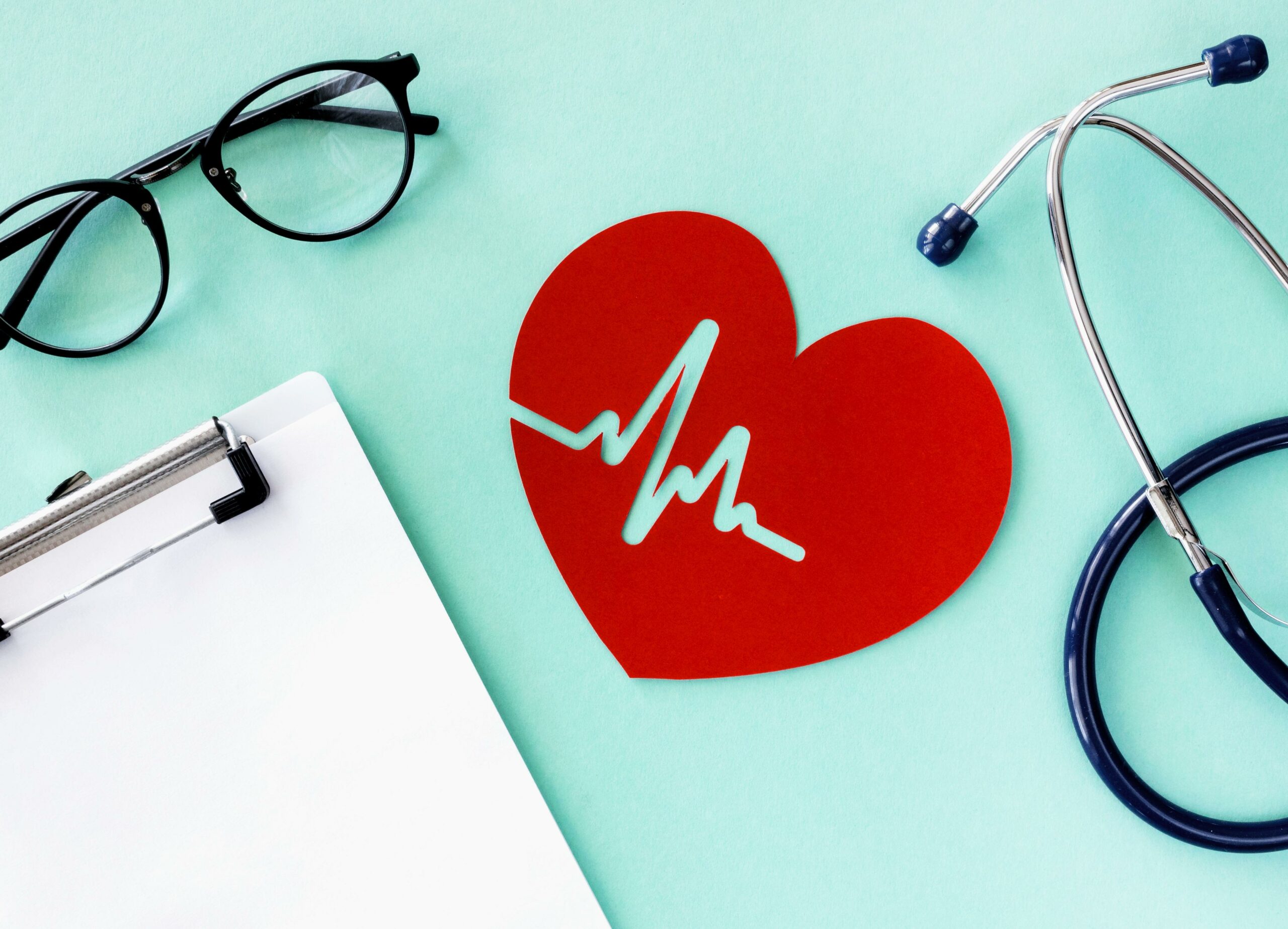 top-view-paper-heart-with-heartbeat-stethoscope